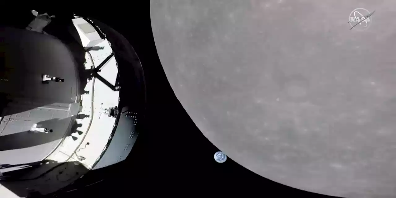 NASA capsule buzzes moon, last big step before lunar orbit