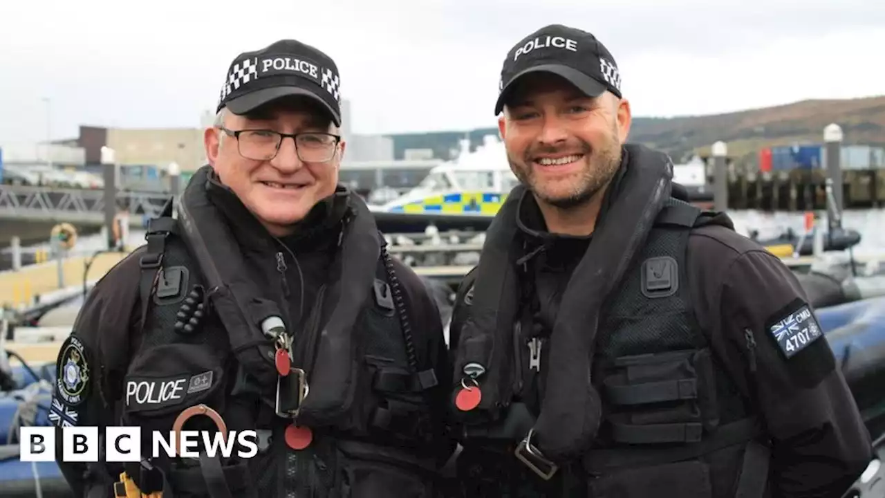 Two officers awarded for rescuing four people from loch