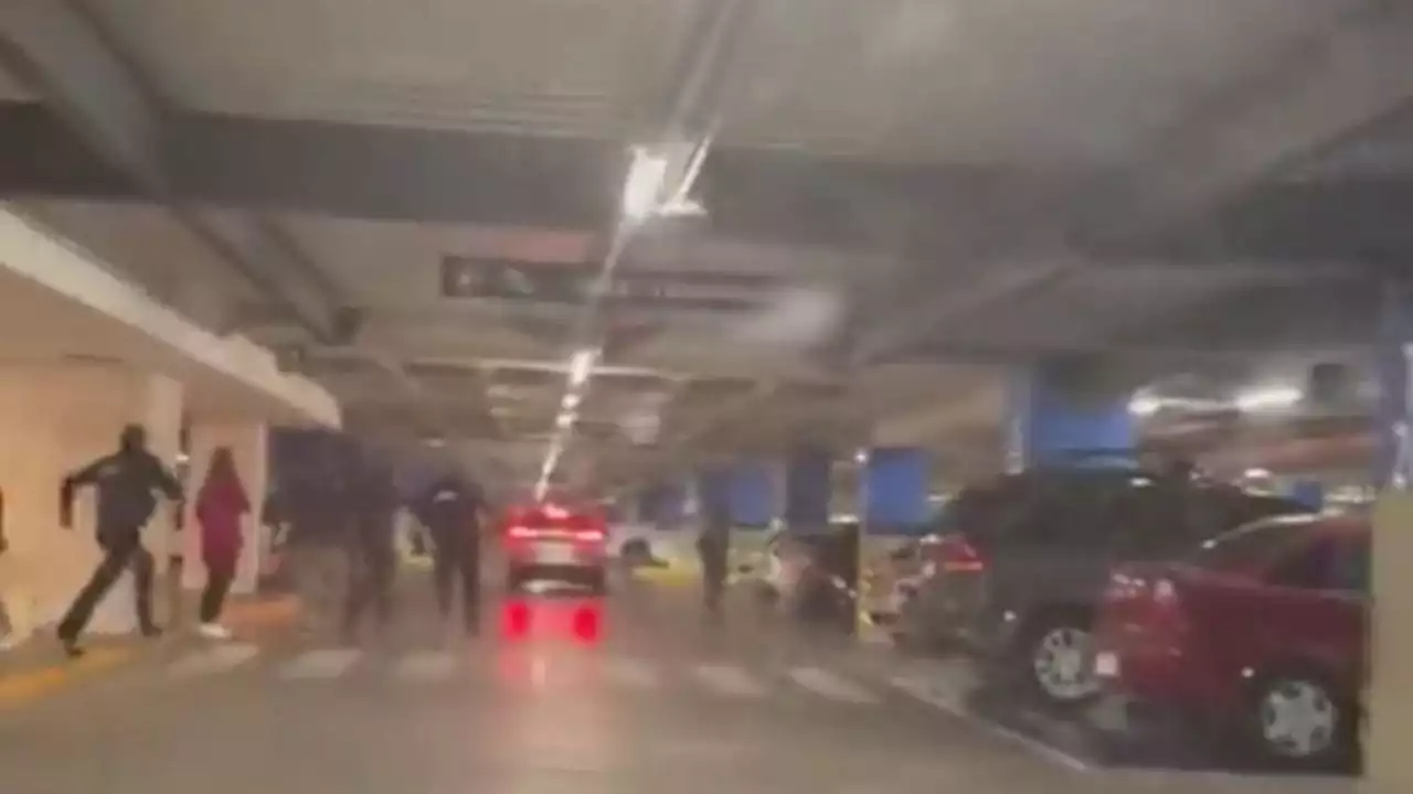 VIDEO | Minutos de terror en Mítikah: registran disparos en estacionamiento de centro comercial