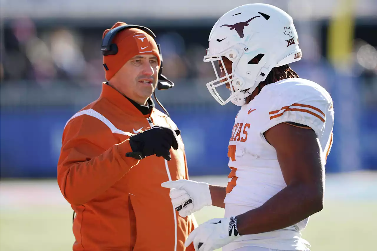 Big 12 title game in play for UT as Bijan Robinson mulls future