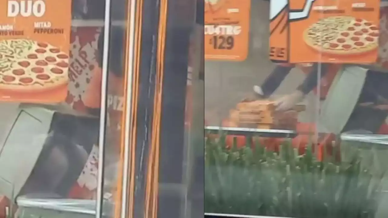 Captan a empleado de Little Caesars sacando cajas de la basura ¿para volverlas a usar? (VIDEO)