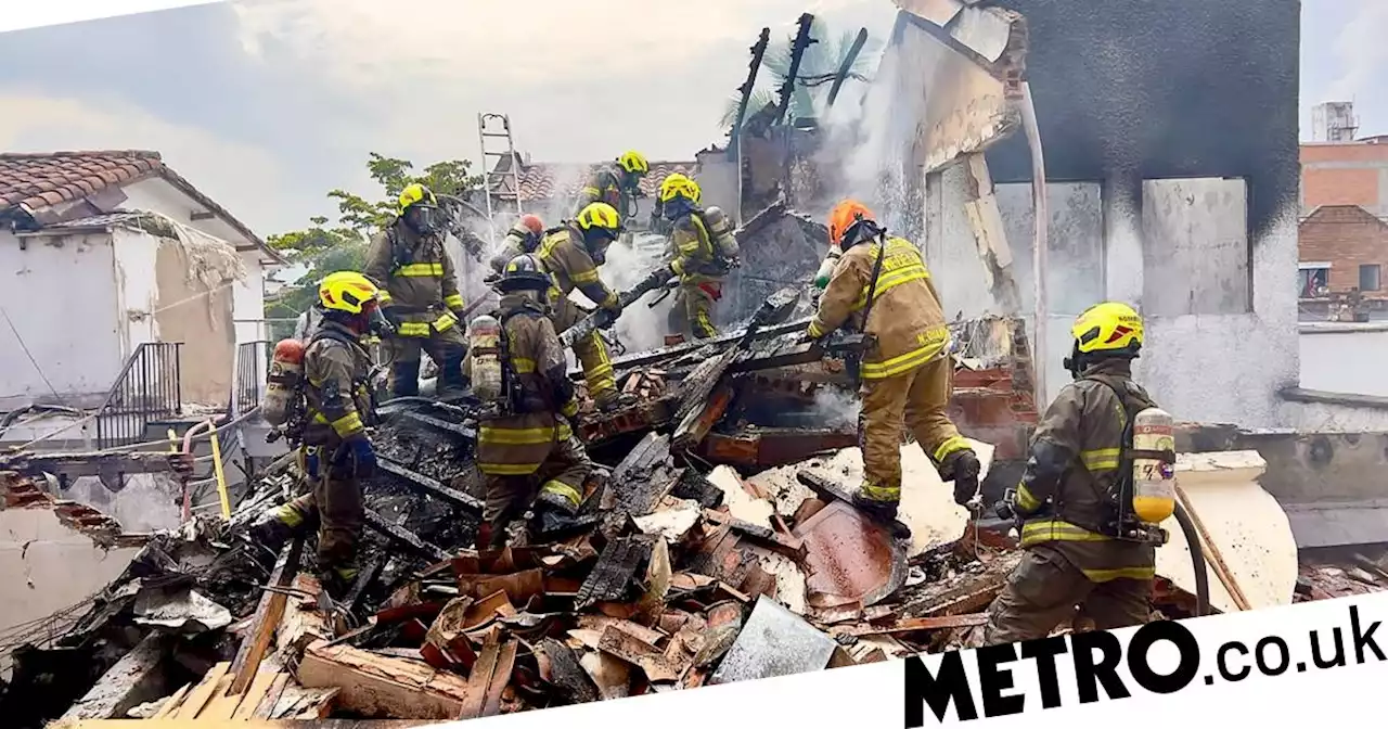 Eight dead after plane crashes into homes in Colombia