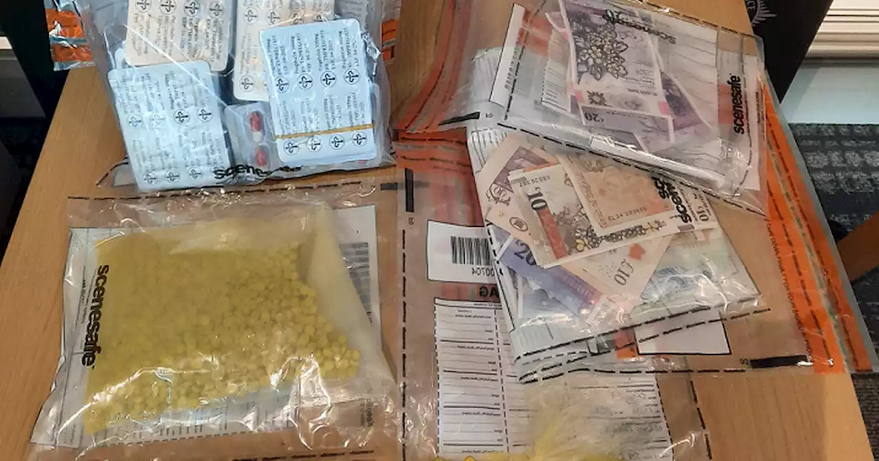 Two arrests after 'drugs, cash and electronics' seized in East Belfast