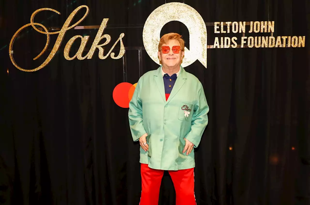 Elton John & His Family Ring In the Holidays With Saks Fifth Avenue Window Reveal