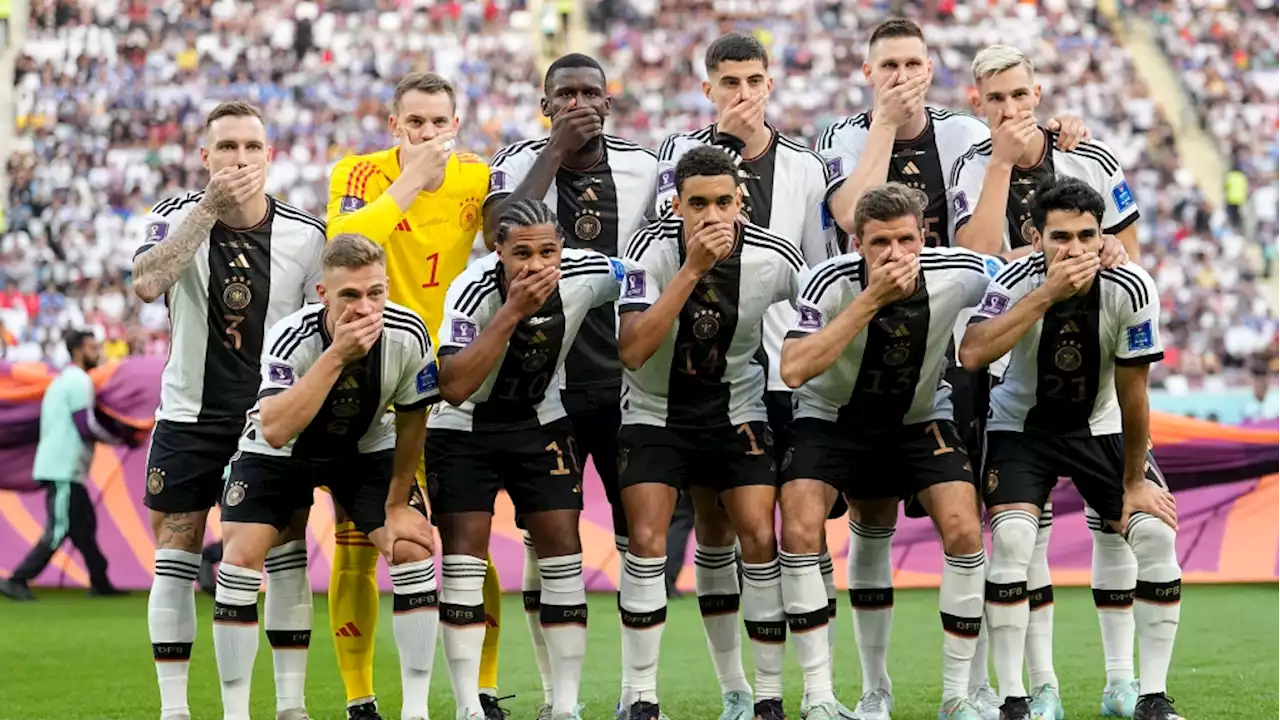 Germany players cover mouths for World Cup match team photo in FIFA protest