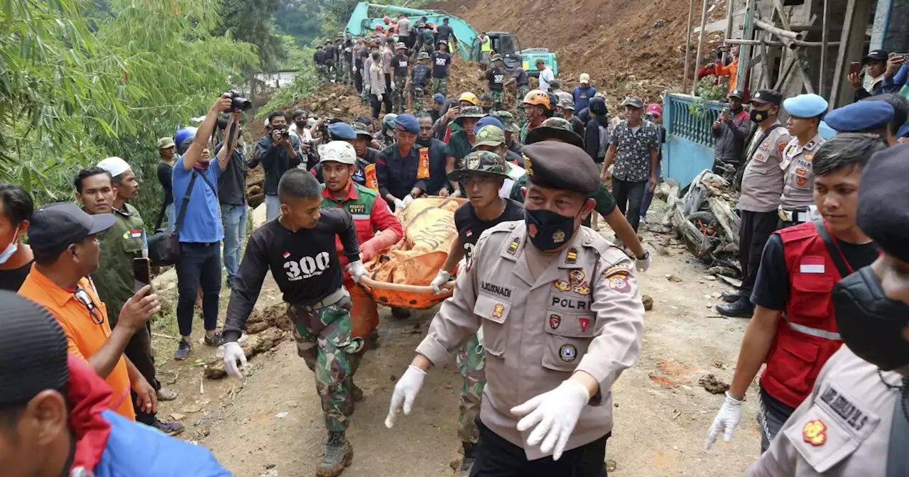 Indonesian rescuers search through rubble of quake as death toll rises to 268