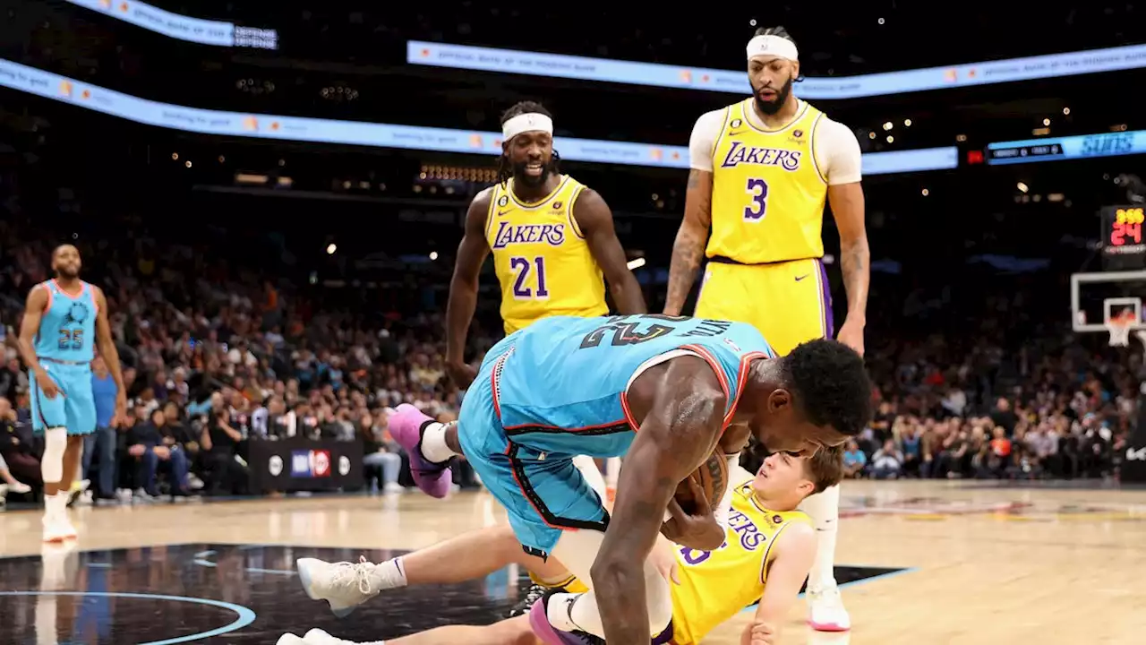 Lakers' Patrick Beverley ejected after knocking over Suns big man Deandre Ayton