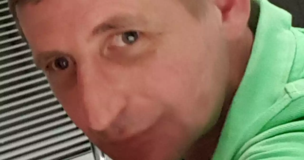 First picture of man found dead in Glasgow flat as another charged