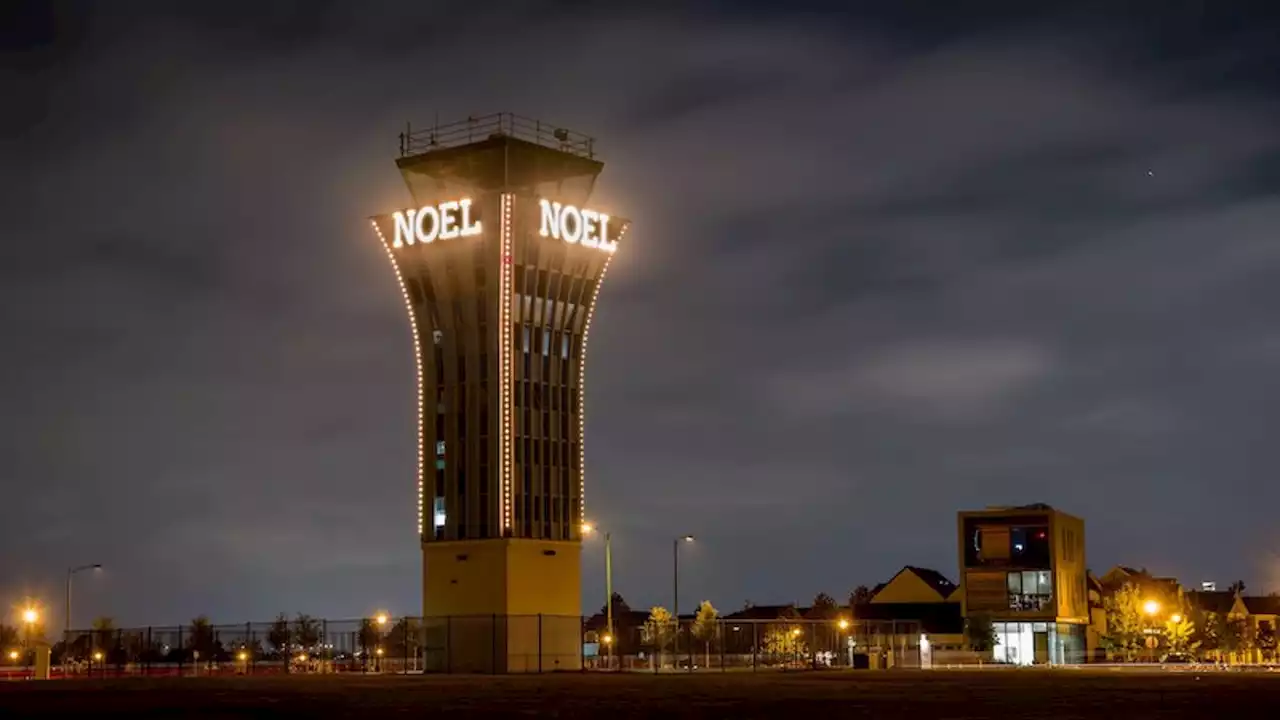 Tower lighting holiday celebration in Mueller neighborhood