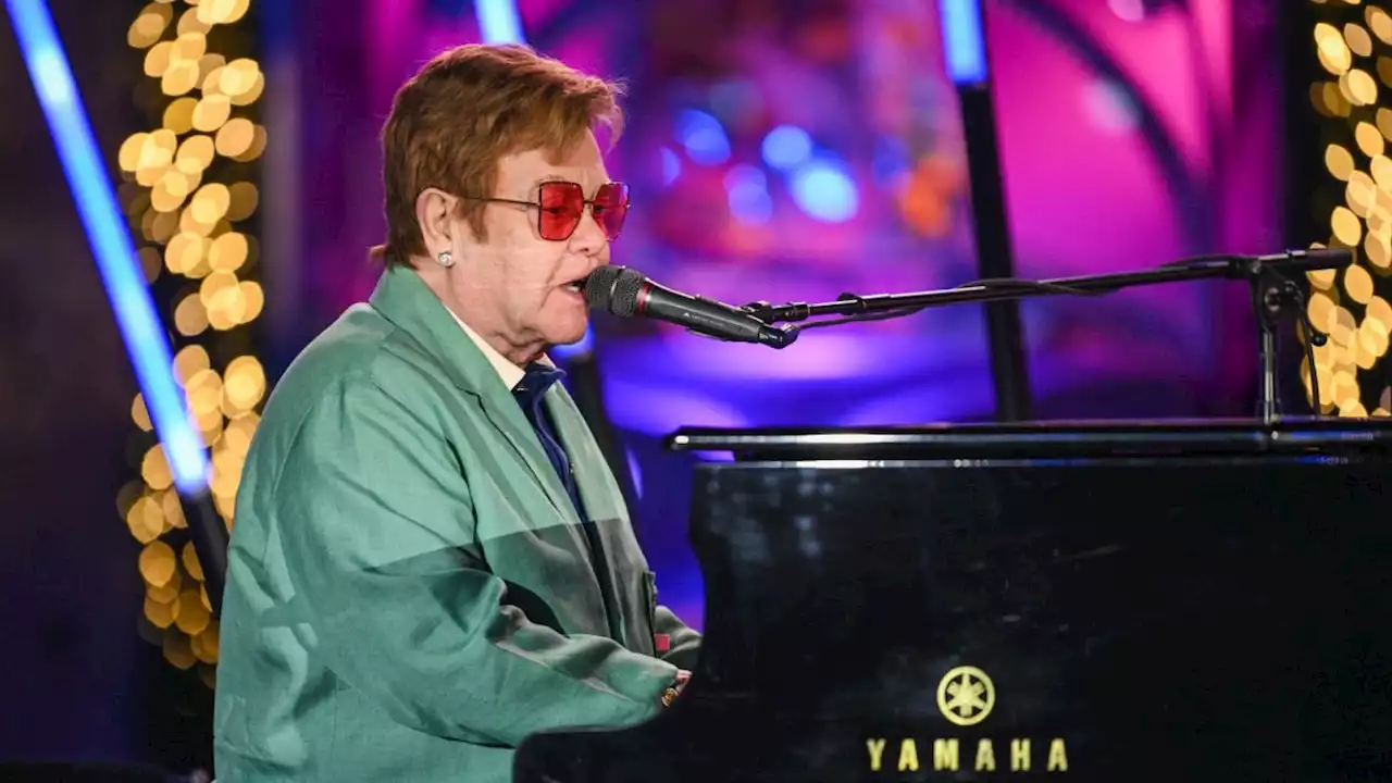 Sir Elton John Performed as a Surprise Guest at Saks' Holiday Window Unveiling