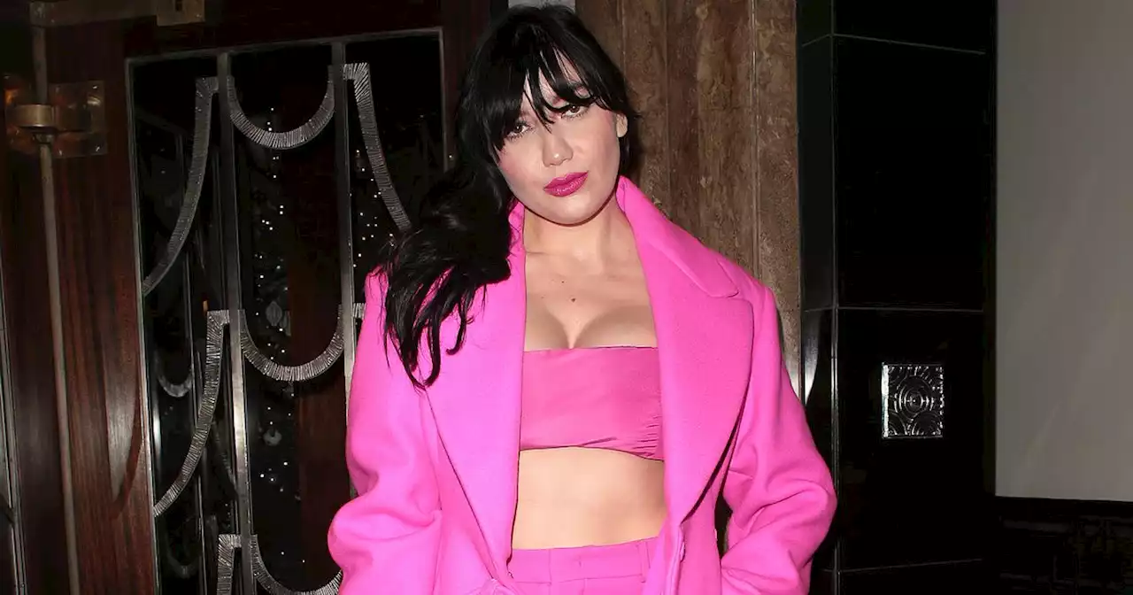 Daisy Lowe skips maternity wear for Barbie-core croptop to show growing bump