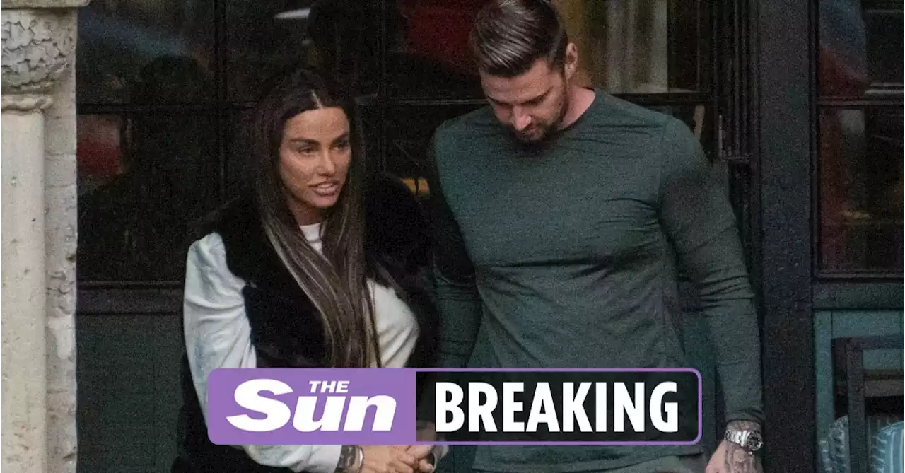 Katie Price and Carl Woods back on as they kiss and hold hands