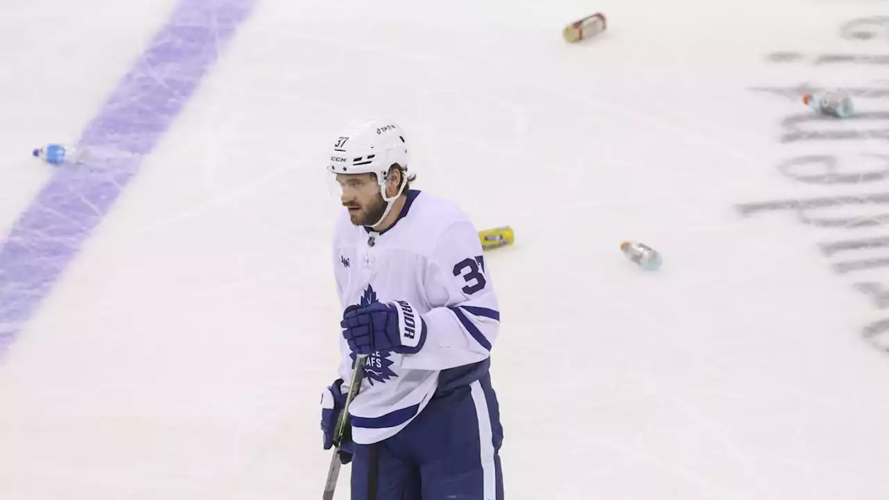 New Jersey Devils fans litter ice after three disallowed goals vs. Toronto Maple Leafs