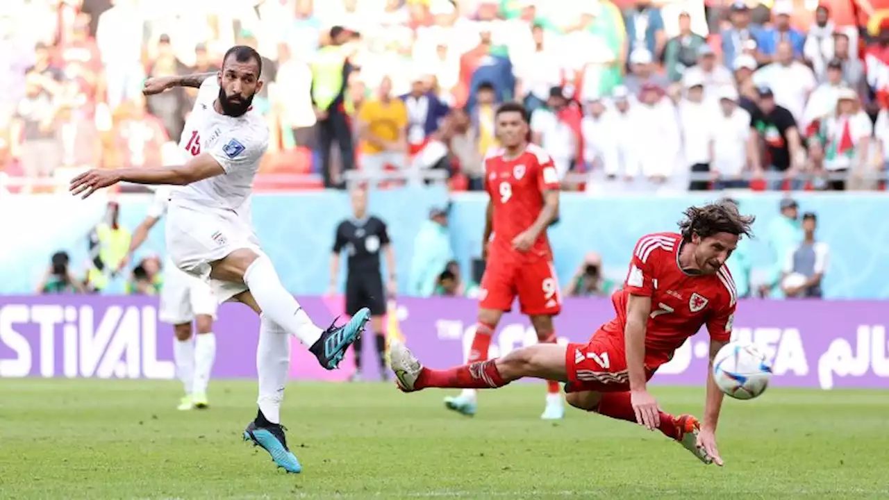 Iran beats 10-man Wales to keep World Cup qualification hopes alive | CNN