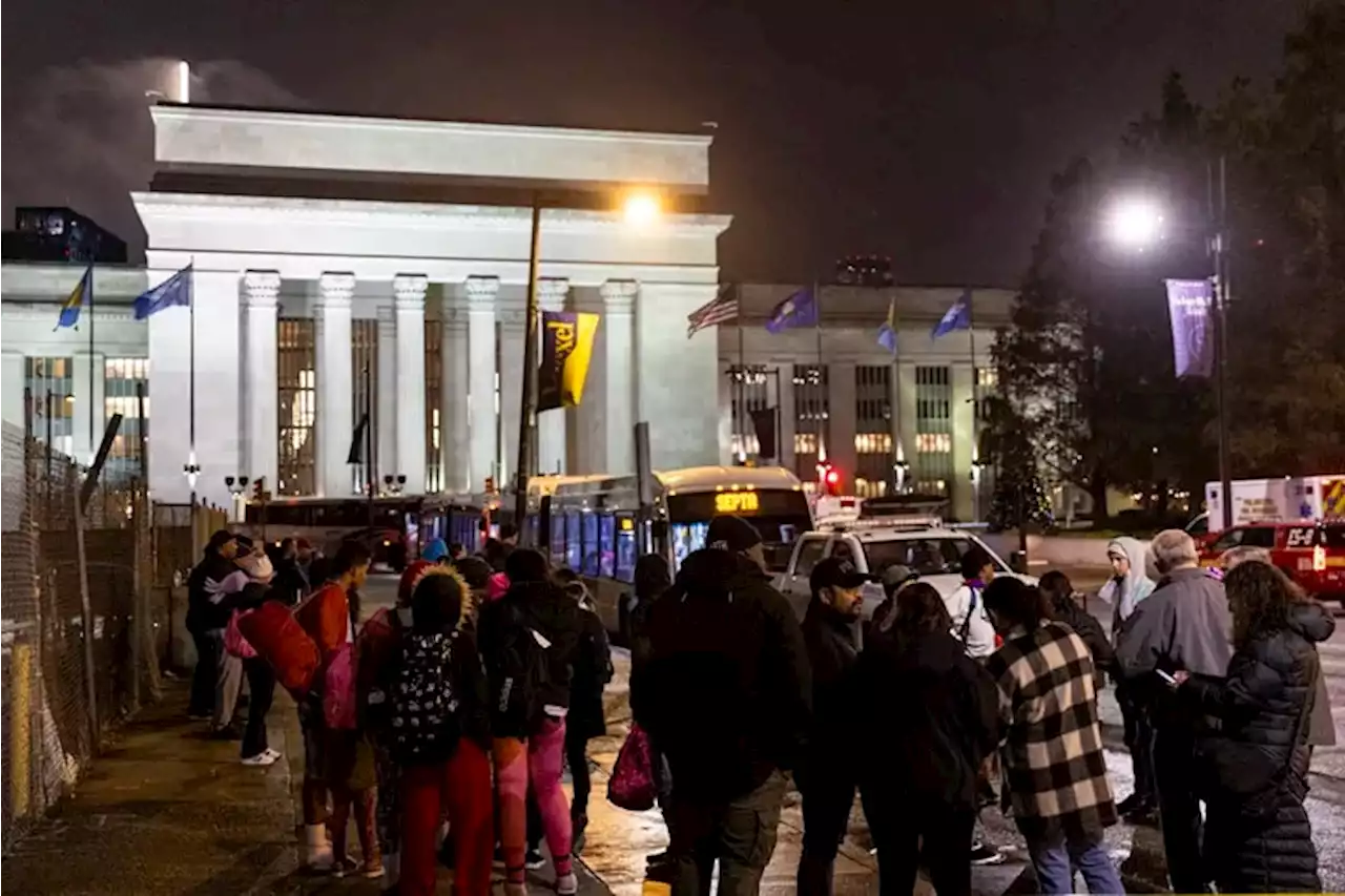 A third bus carrying immigrants from Texas arrives in Philadelphia, a fourth close behind