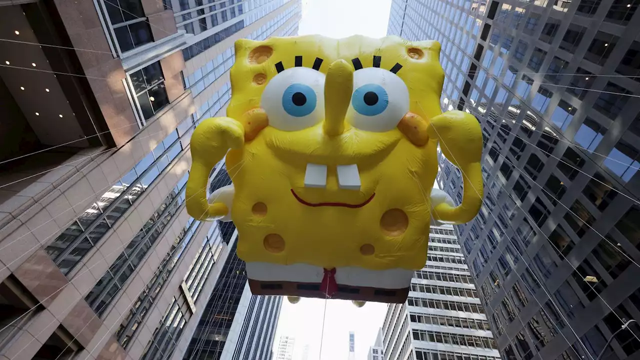 Macy's Thanksgiving parade in pictures: SpongeBob, Snoopy and Pikachu soar above New York