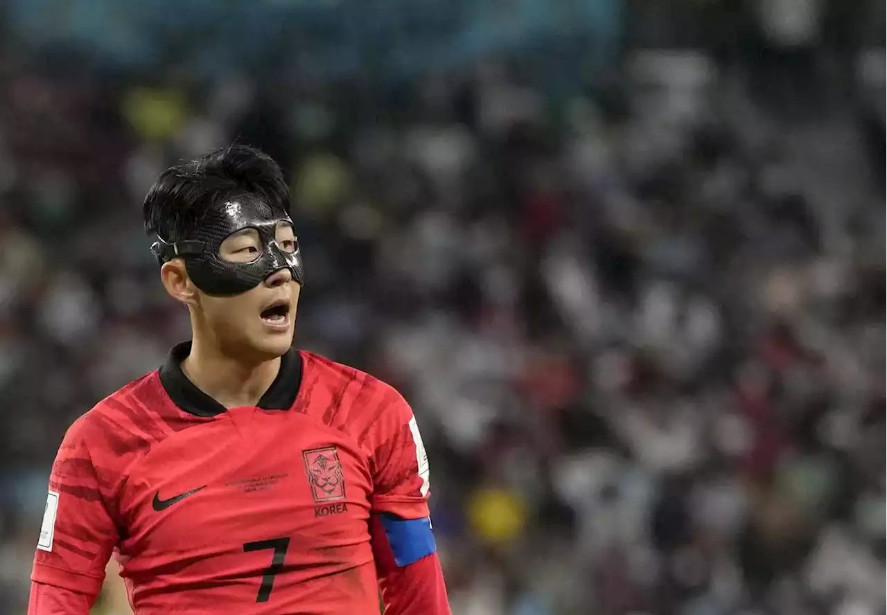 South Korean fans don masks to support captain at FIFA World Cup 2022