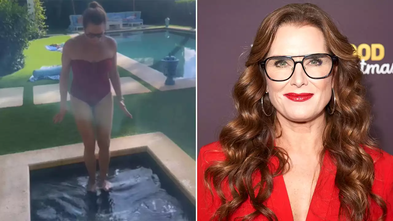 Brooke Shields shows off her toned body in red swimsuit for icy Thanksgiving plunge