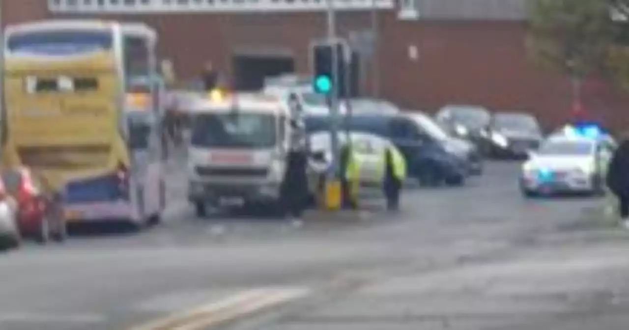 Emergency services called to busy junction after crash