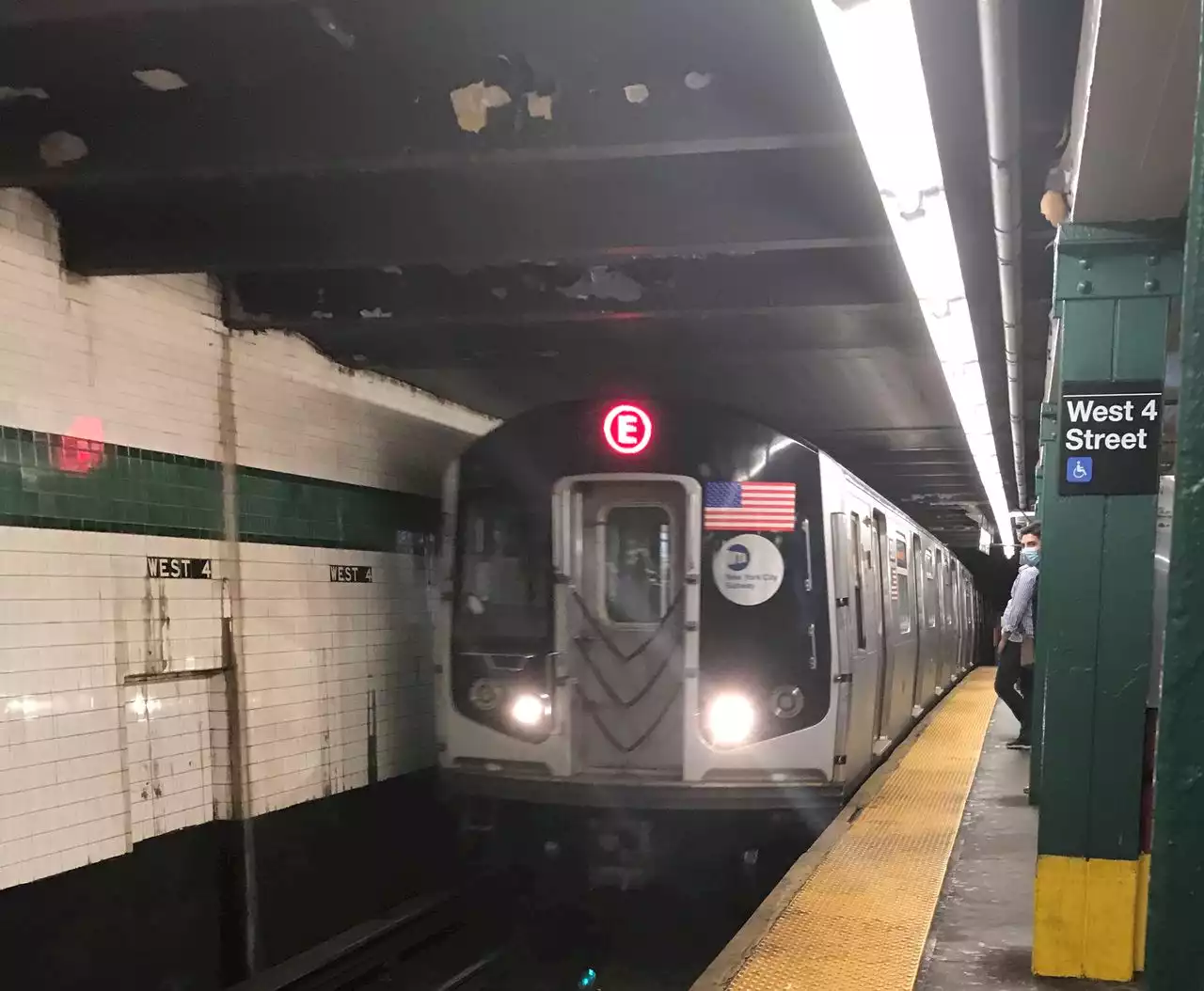 NYPD officers, bystander save man who fell on subway tracks