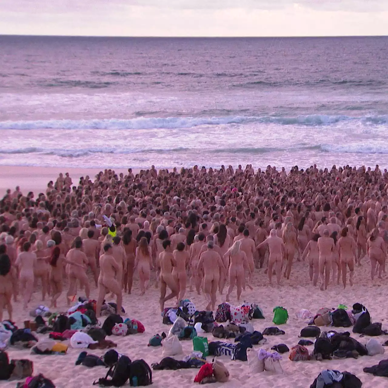 Thousands go nude on Bondi Beach to raise awareness for skin cancer 'time bombs'