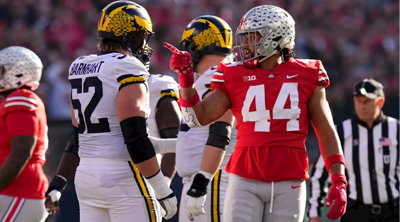 Watch: Jim Harbaugh Holds Michigan Players Back During Near-Brawl With Ohio State