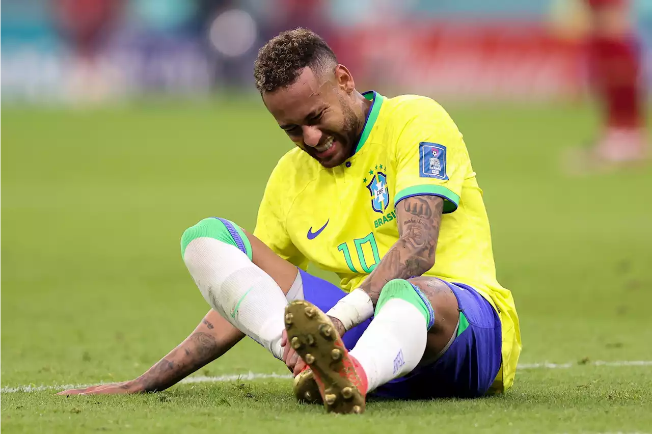 Brazil team doctor urges calm as star forward Neymar is ruled out of World Cup group stage