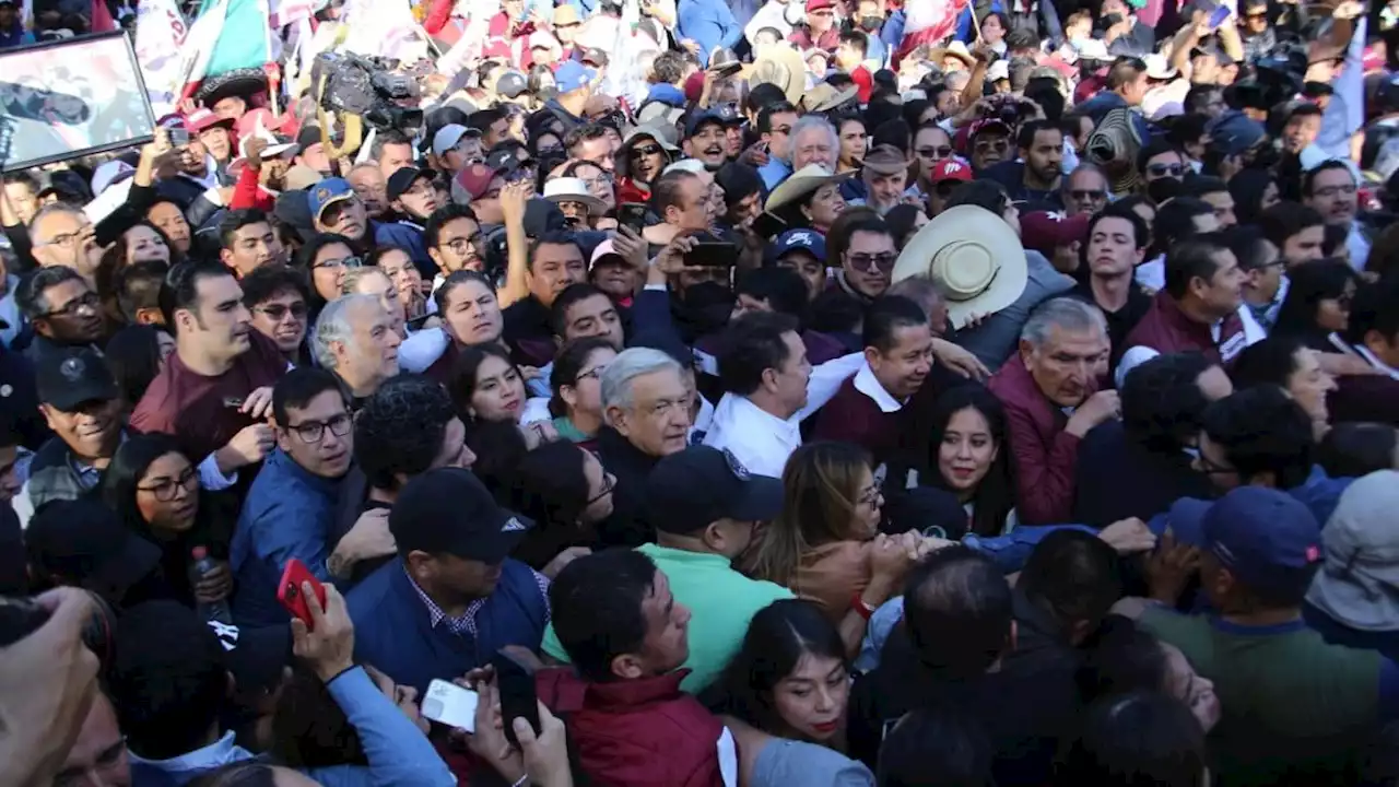 Asistentes a marcha muestran su apoyo a AMLO (FOTOS)