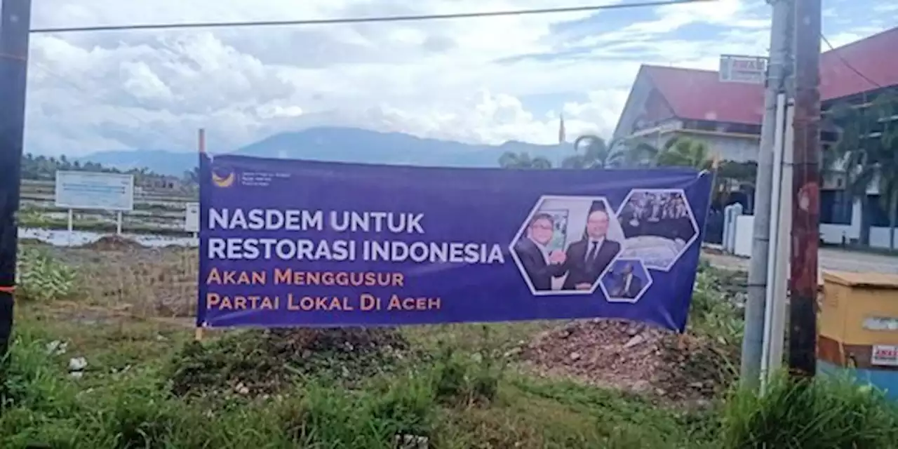 Spanduk 'NasDem Akan Gusur Partai Lokal' Terbentang di Aceh, Pengurus: Itu Fitnah | merdeka.com