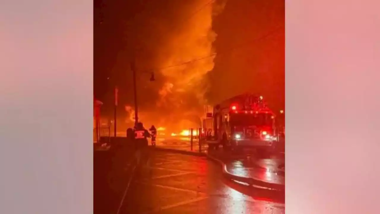 Wind-driven fire destroys buildings at seaport marina in Mystic, Connecticut, forcing residents from homes