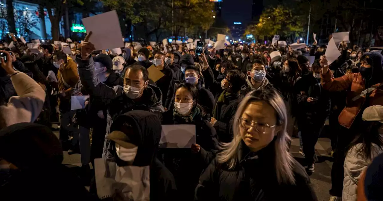 Covid-19 cases in China hit new record high after weekend of protests