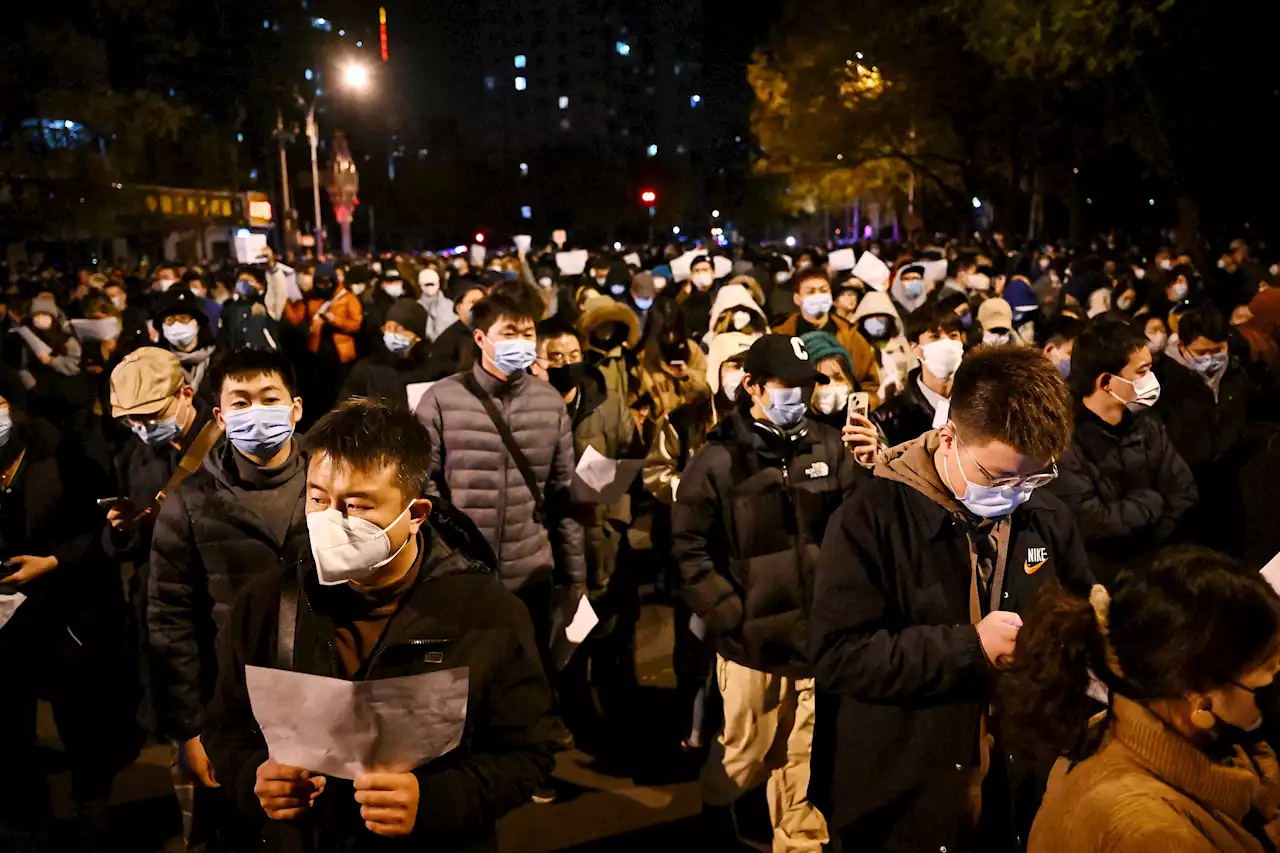 Chinese protesters tear down Wuhan gates as COVID battle comes full circle