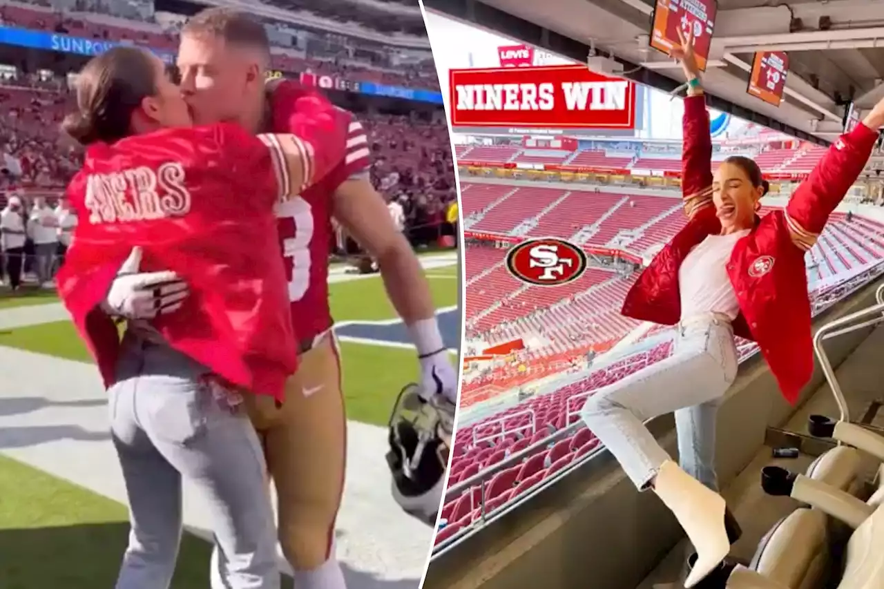 Olivia Culpo and Christian McCaffrey kiss on the sideline before 49ers-Saints game