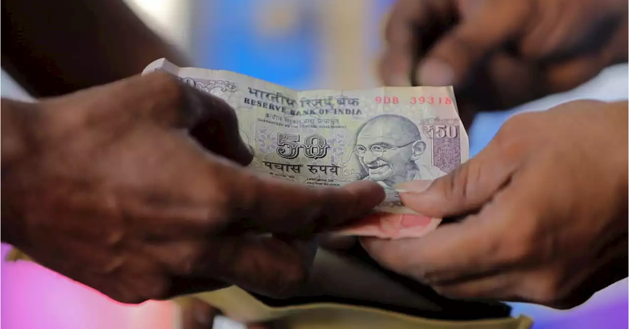 INDIA RUPEE Rupee dips less than peers on support at 81.80-81.85/USD