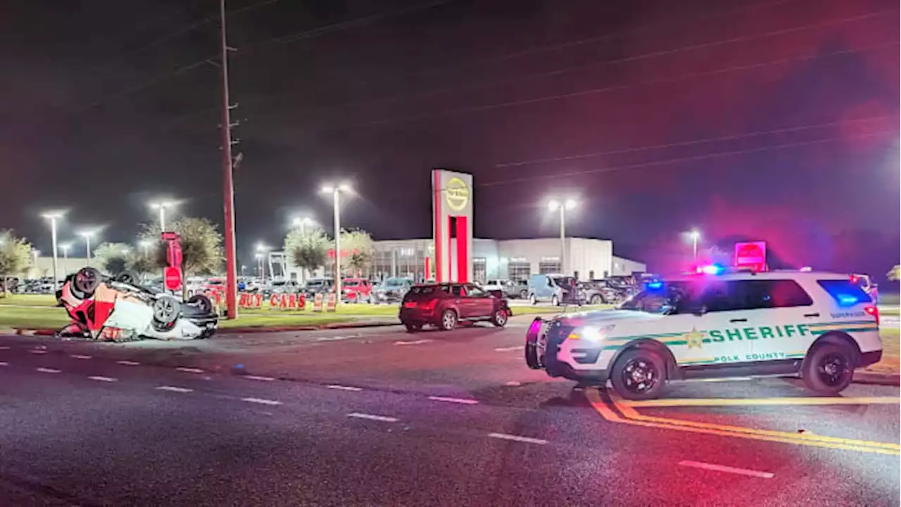 Woman dies in test drive crash outside Florida car lot