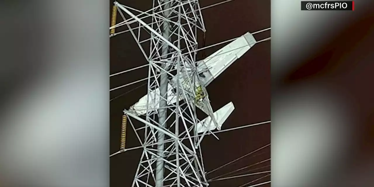 Crews rescue 2 from plane caught in power lines in Maryland