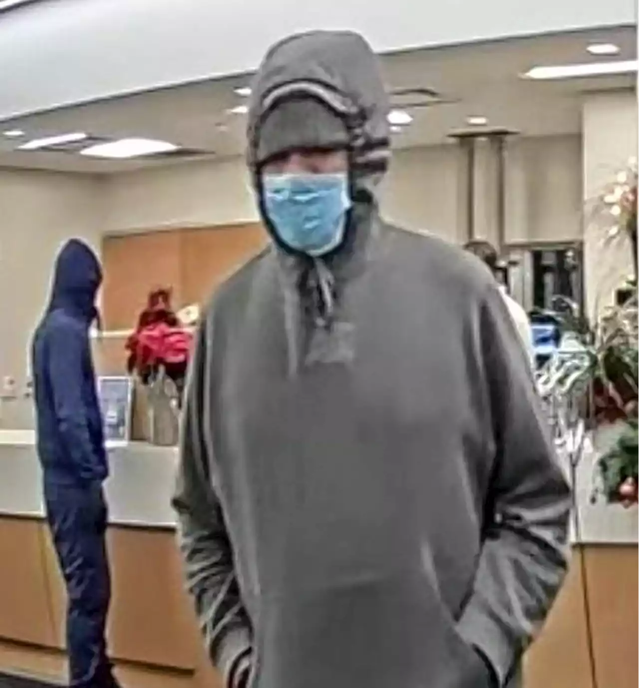 Police searching for two men after Elmhurst bank robbery