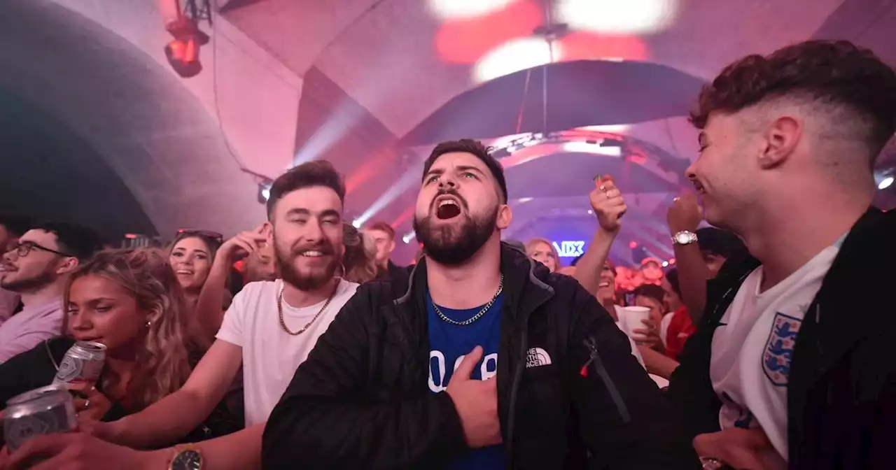 Moment Wales fan sings national anthem as England supporters BOO at fan zone