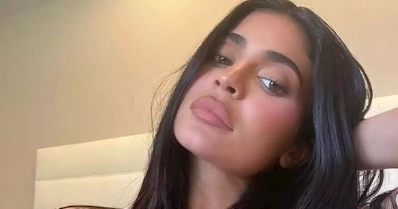 Kylie Jenner posts then quickly deletes racy video of herself in just a bathrobe