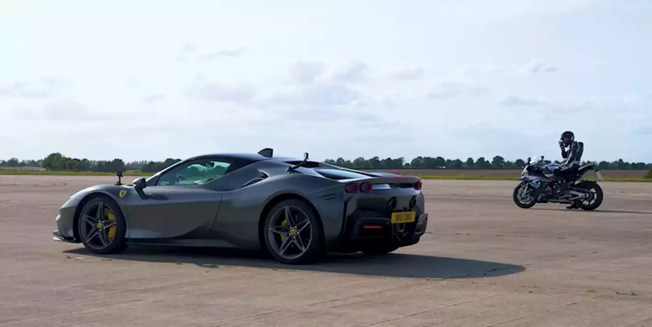 Watch a Ferrari SF90 Take on a BMW Superbike in a Drag Race