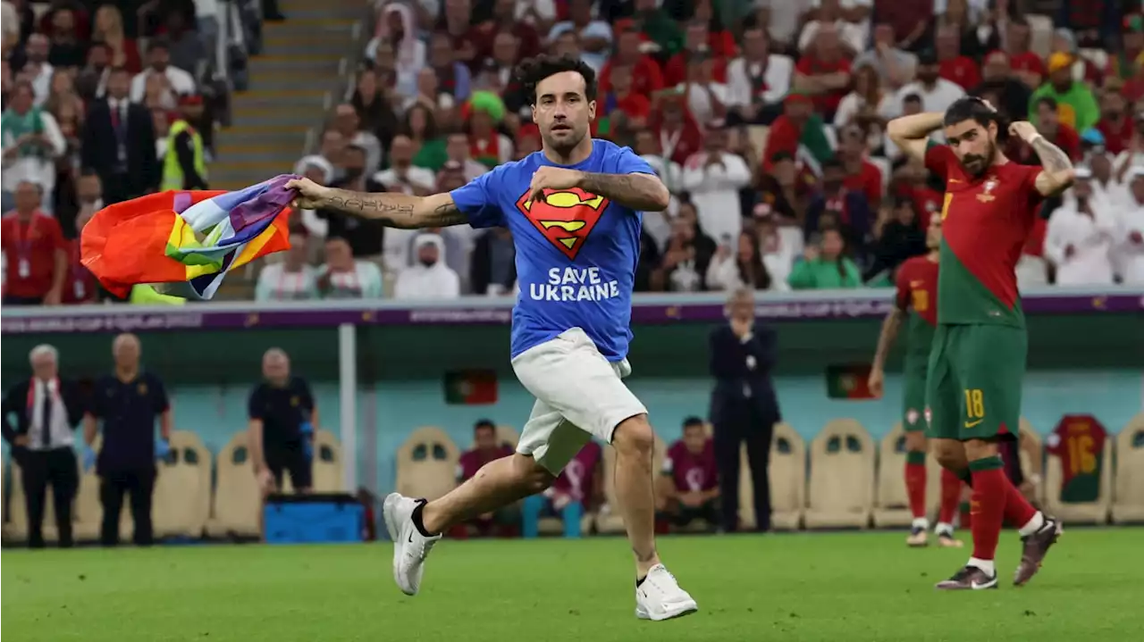 World Cup Pitch Invader Carries Rainbow Flag Into Portugal-Uruguay Match