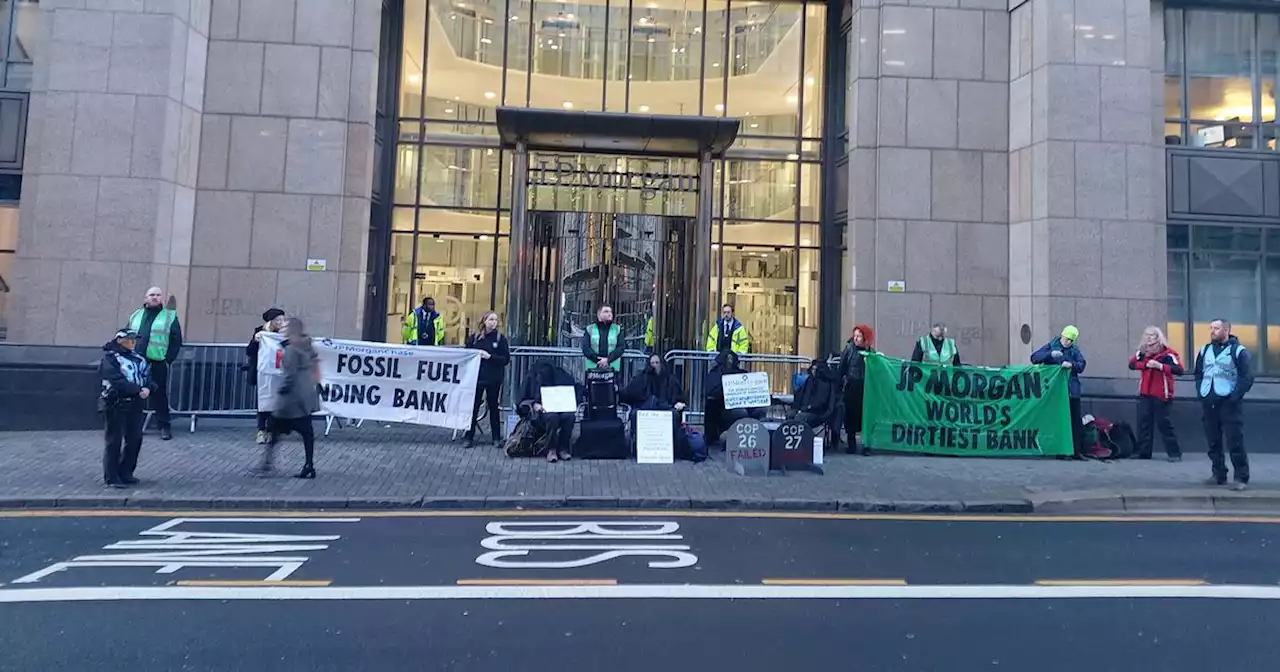 Climate activists block entrance to Glasgow bank to protest 'failure' of COP26