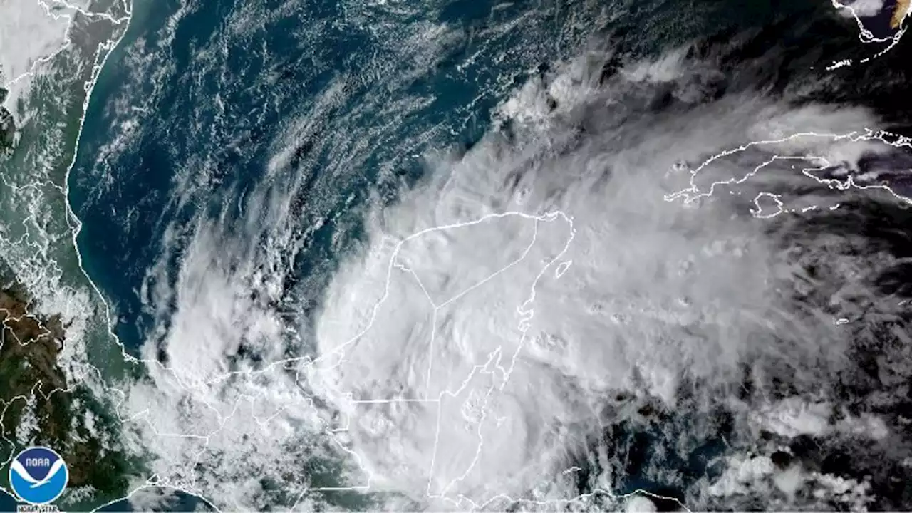 Hurricane Lisa Makes Landfall in Belize with Storm Surge, Heavy Winds