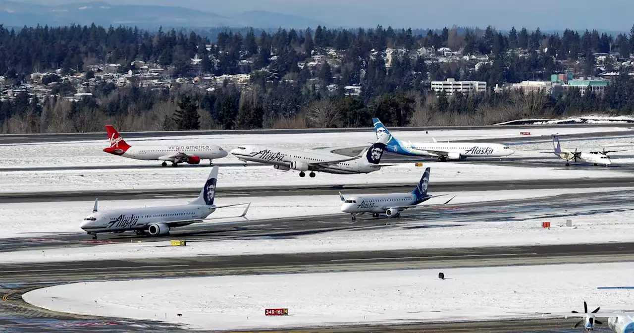 Alaska Airlines canceled at least 100 flights Tuesday as Seattle area gets snow