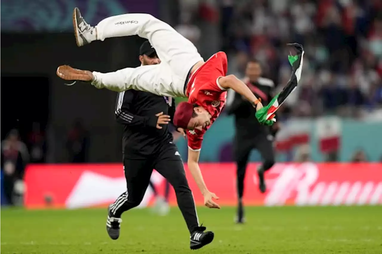 Man runs onto field during Tunisia-France match at World Cup