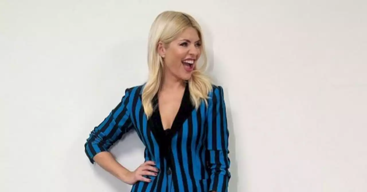 Holly Willoughby labelled a 'modern Marilyn Monroe' as she poses in minidress