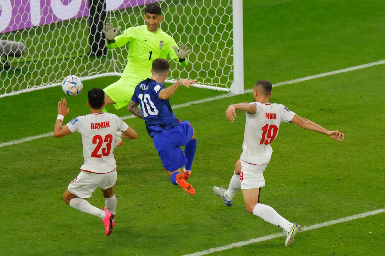 Wounded Pulisic sends United States through to last 16 with win over Iran