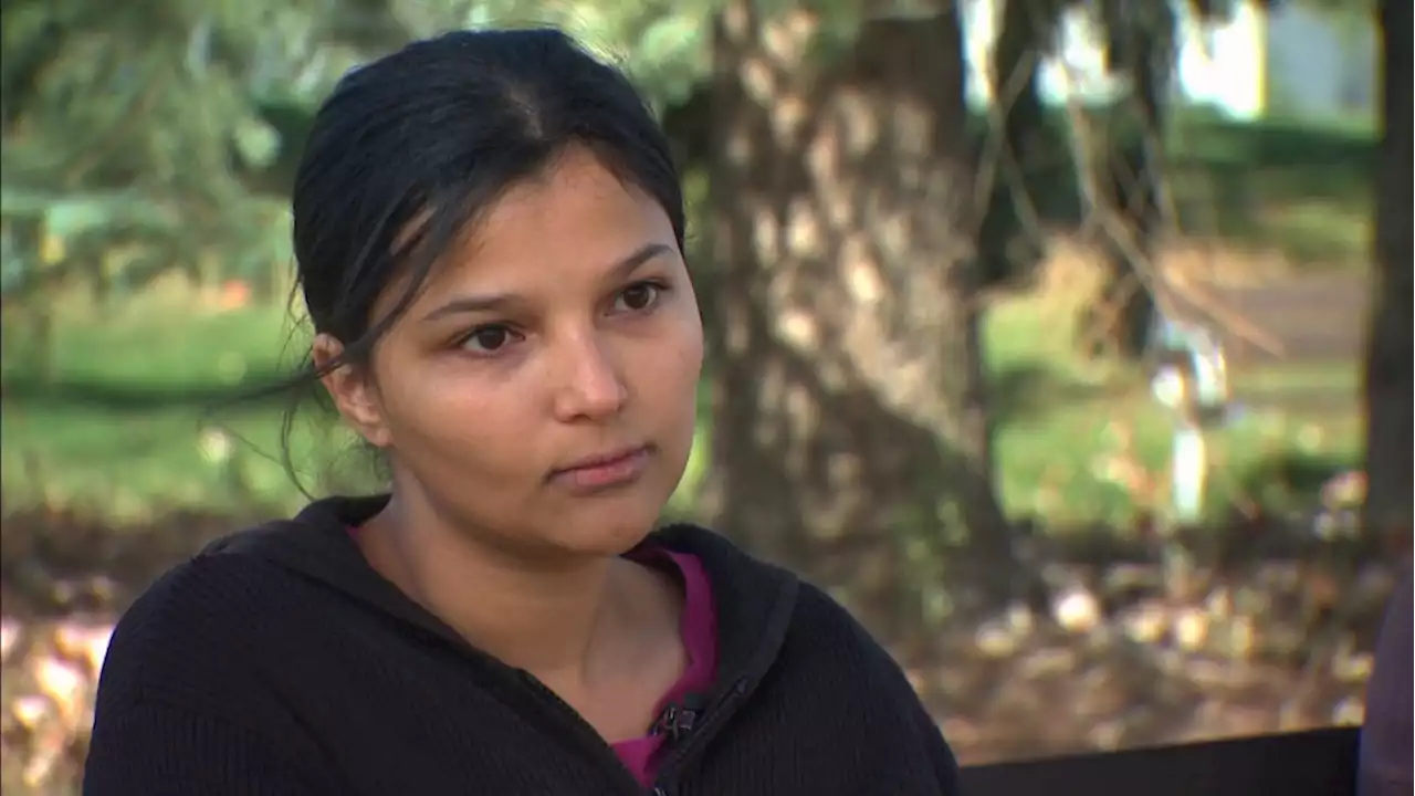 Refugee stabs herself with knife in front of federal official amid desperate plea for housing