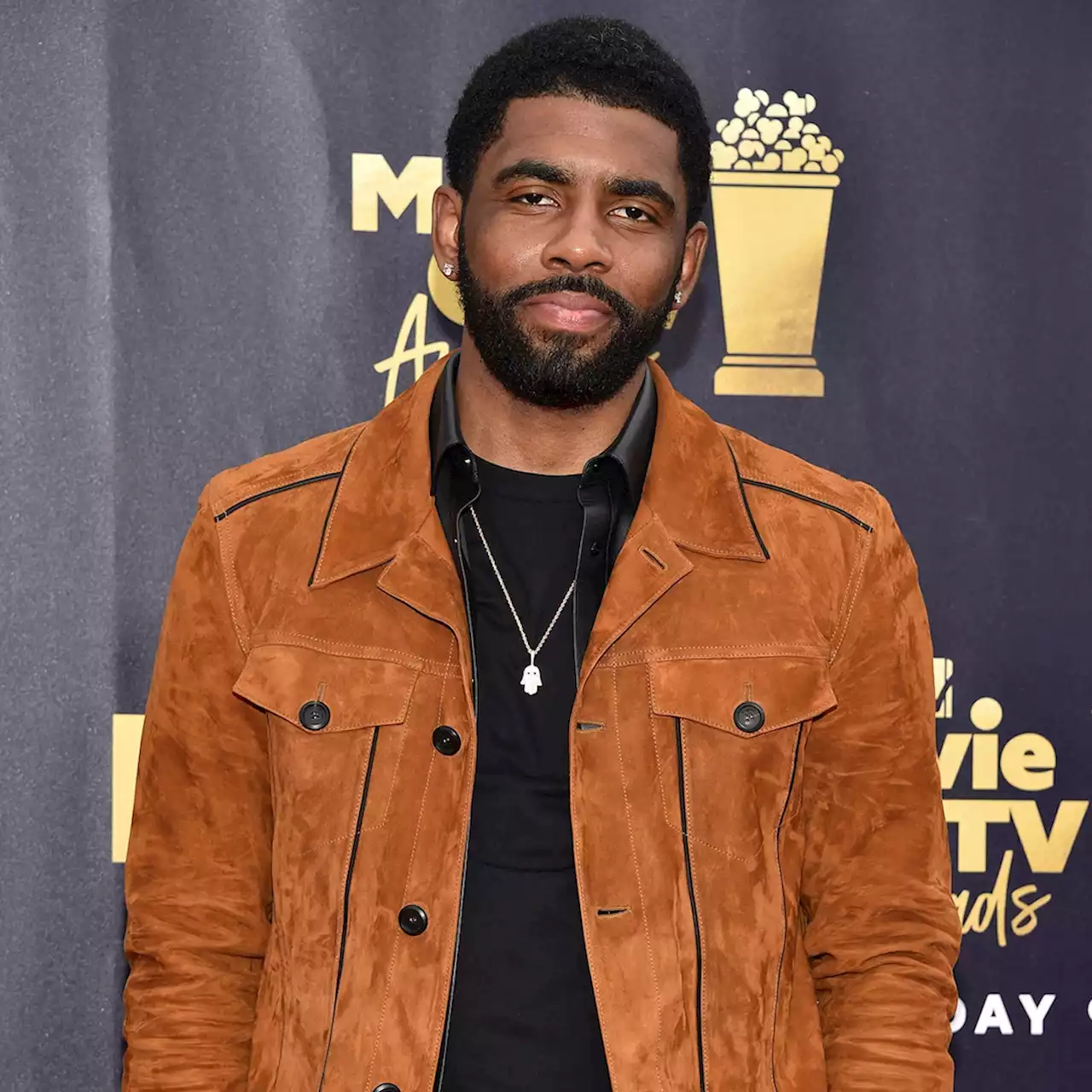 Brooklyn Nets Suspend Basketball Player Kyrie Irving After He “Failed to Clarify” Stance on Antisemitism - E! Online