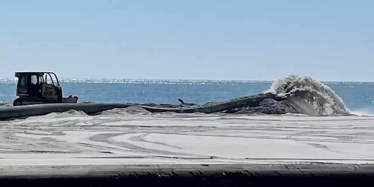 Month-long Perdido Pass dredge project creates new beach west of jetty